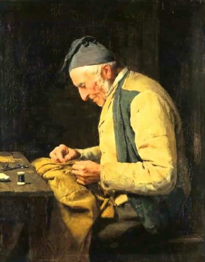 A man sewing